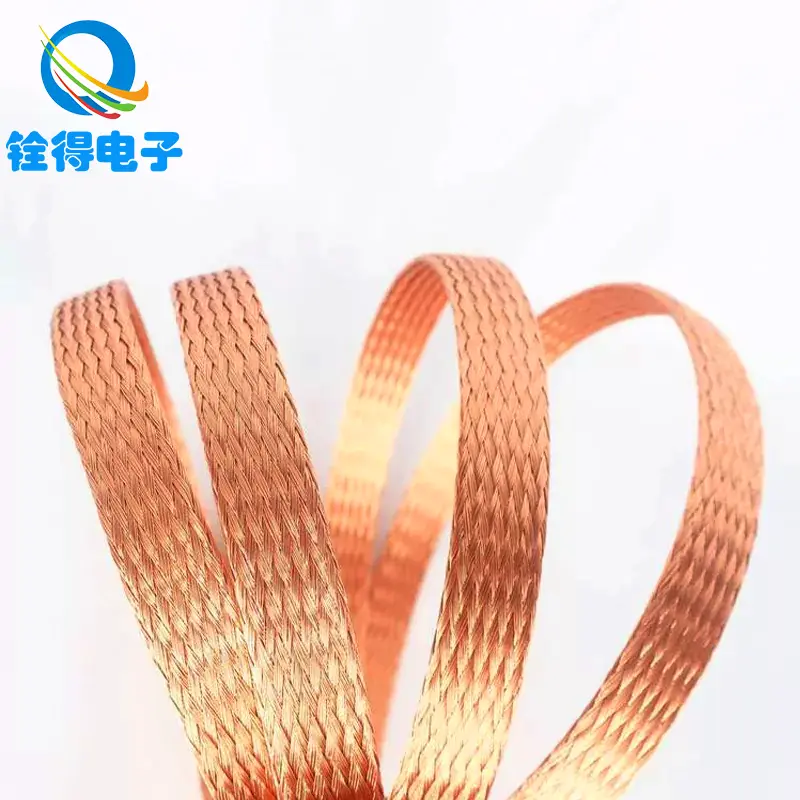 Qual é a função da trança de cobre no cabo coaxial?